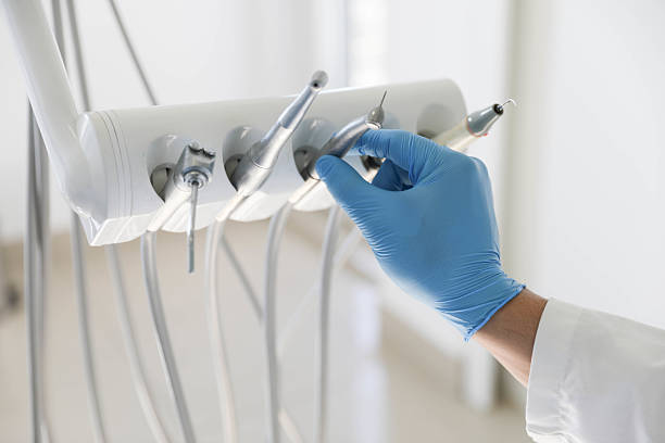 Professional Emergency Dentist technician working in Webberville, MI